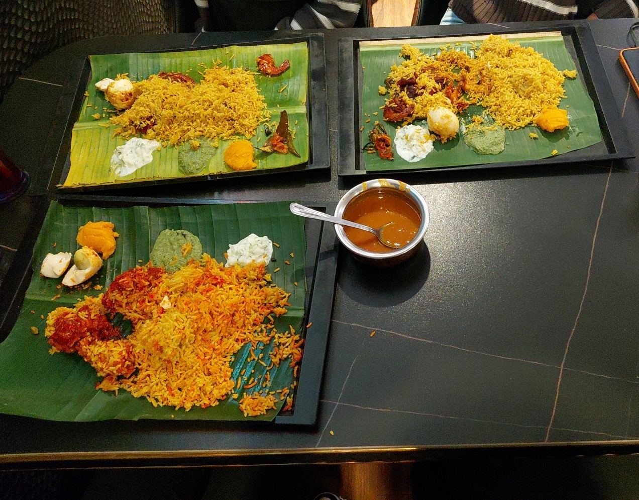 Bamboo biryani on banana leaf trays